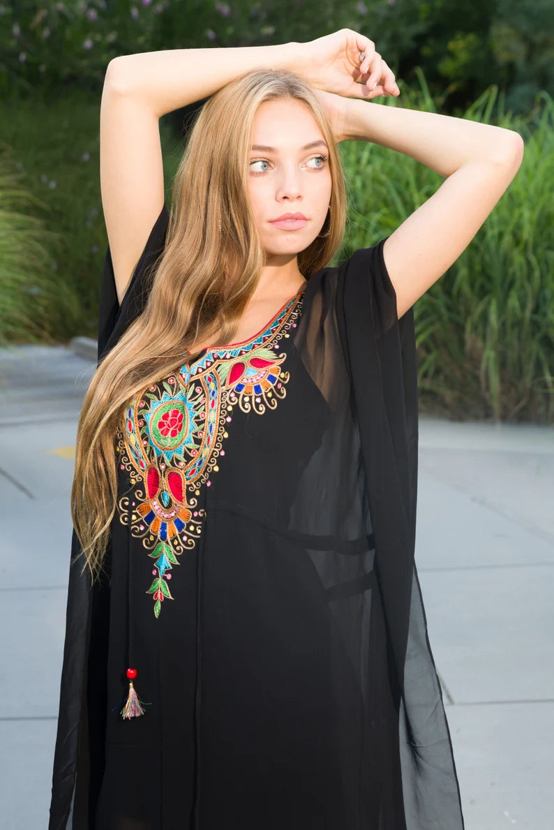 Black tunic dress with embroidered details