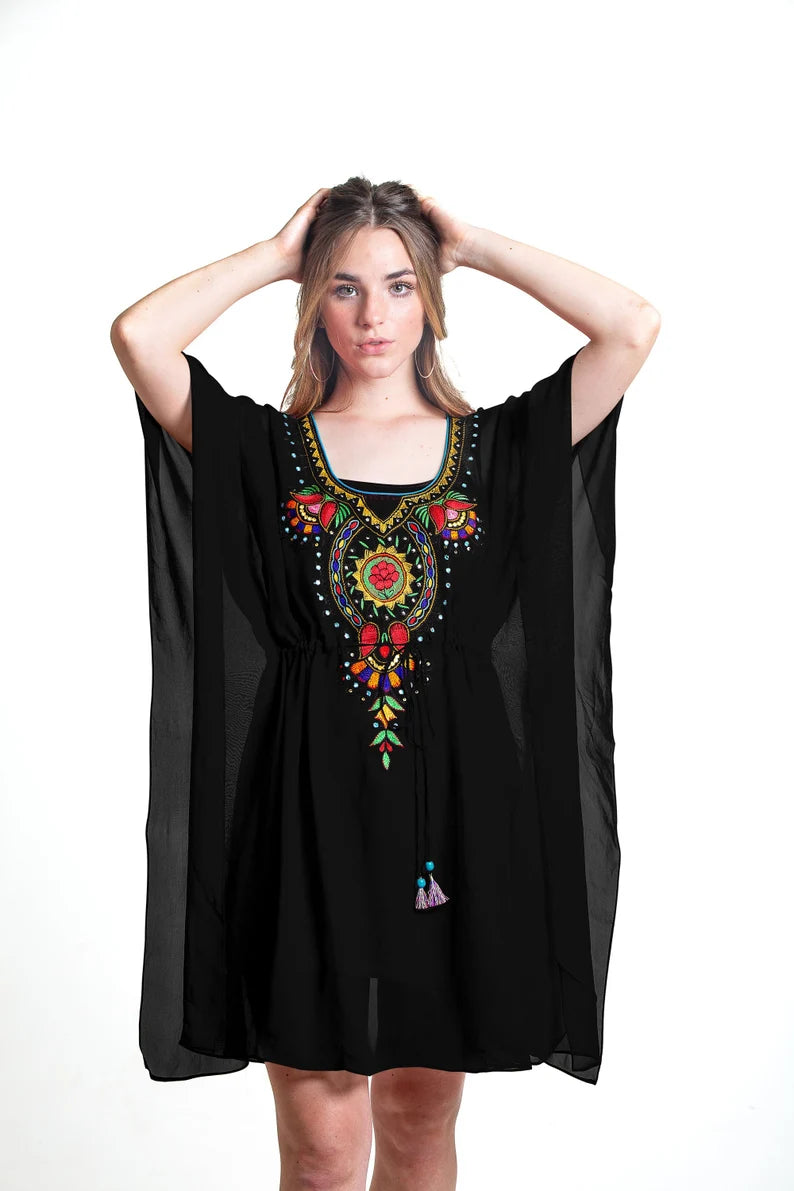 Black tunic dress with embroidered details
