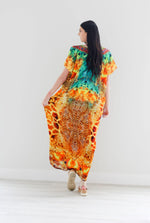 Load image into Gallery viewer, Silk caftan dress in yellow animal print design
